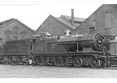 Ex-Midland Railway 3P 4-4-0 No 716 gently simmers alongside one of Saltley shed's roundhouses in September 1936