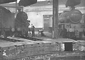 BR Standard 5MT 4-6-0 No 73069 is being repaired by one of Saltley's fitters on 22nd November 1964
