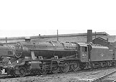 Ex-LMS 8F 2-8-0 No 48185 is being prepared to return to its home shed of Toton during the 1960s