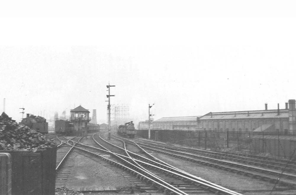 Looking north from Saltley station with a unidentified ex-MR 0-6-0 2F locomotive on the right and an unidentified ex-MR 0-6-4T locomotive on the left