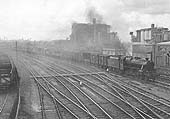Ex-LMS 4-6-0 'Black Five' No 44814 is seen on a class 'D' freight approaching Saltley station on the up goods line