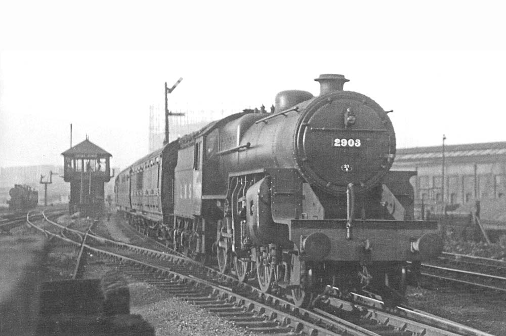 LMS 5P/4F 2-6-0 'Crab' No 2903 is seen passing Saltley Sidings Signal Box as it approaches Saltley station at the head of local passenger service