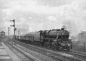 British Railways built 5MT 4-6-0 No 44659 passes on a down freight being banked by Johnson 3F 0-6-0 No 43693