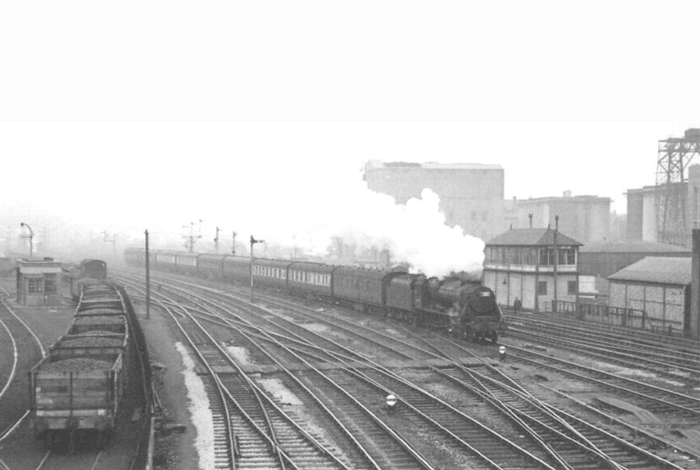 Ex-LMS 4-6-0 Black 5 No 44745 passes the signal box at Saltley junction on a cross country service from Bristol