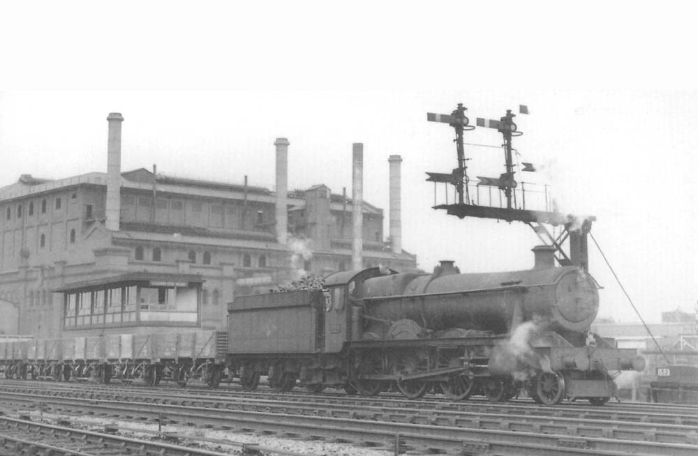 Ex-GWR 4-6-0 No 6985 Parwick Hall returns to Gloucester Horton Road on a freight in the 1960s