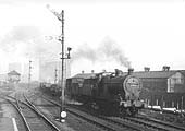 Ex-LMS 0-6-0 4F No 44272 is seen working hard on a down freight service on 28th October 1951