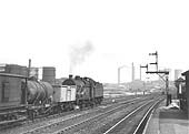 Ex-LMS 0-6-0 4F No 44138 runs tender first past Saltley station on an up working to Washwood Heath sidings