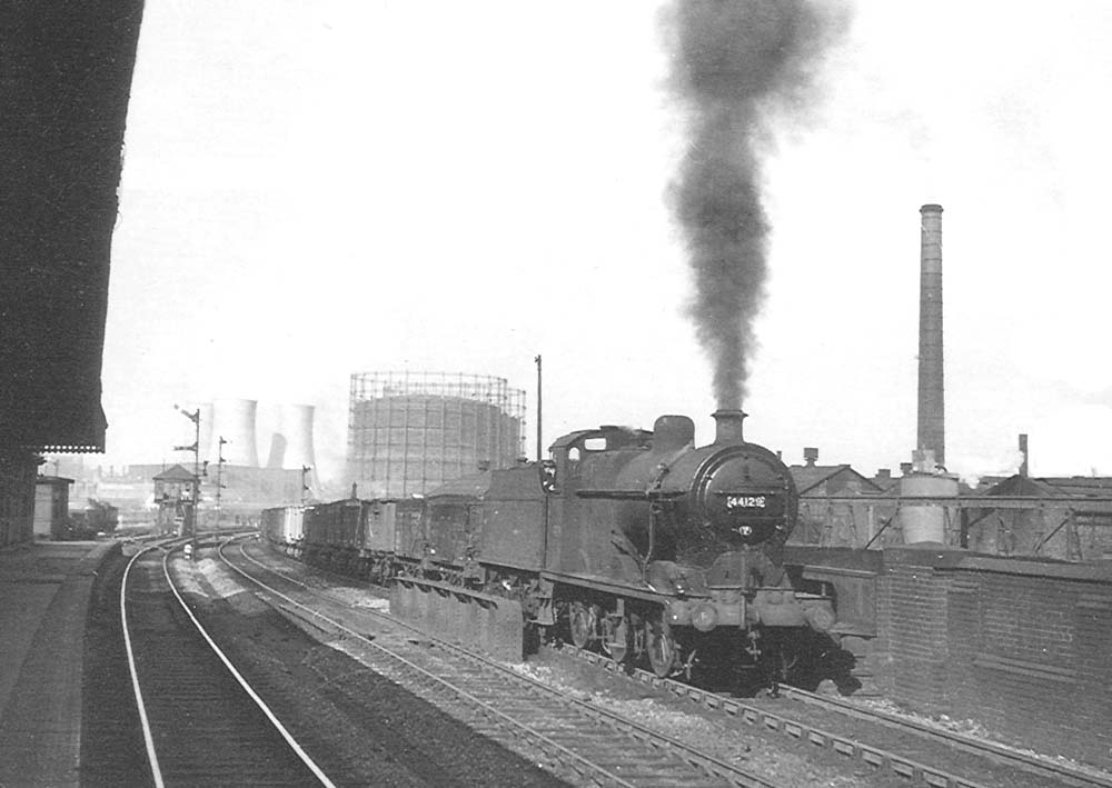 Ex-LMS 4F 0-6-0 No 44129 is seen on the Camp Hill line at the head of a down Class J mineral train