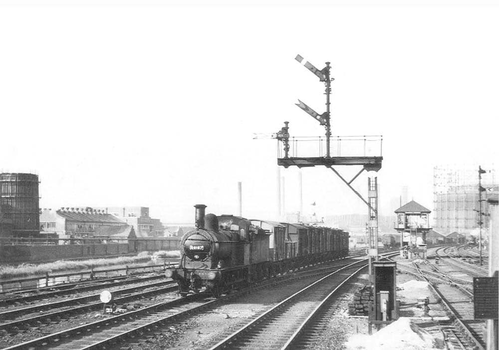 Ex-MR 2F 0-6-0 No 58167 heads a freight working on the Lawley Street down goods line on 8th August 1955