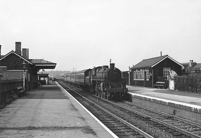 British Railways Standard Class 4 4-6-0 No 75022 passes through Selly Oak on a southbound express on 15th August 1959