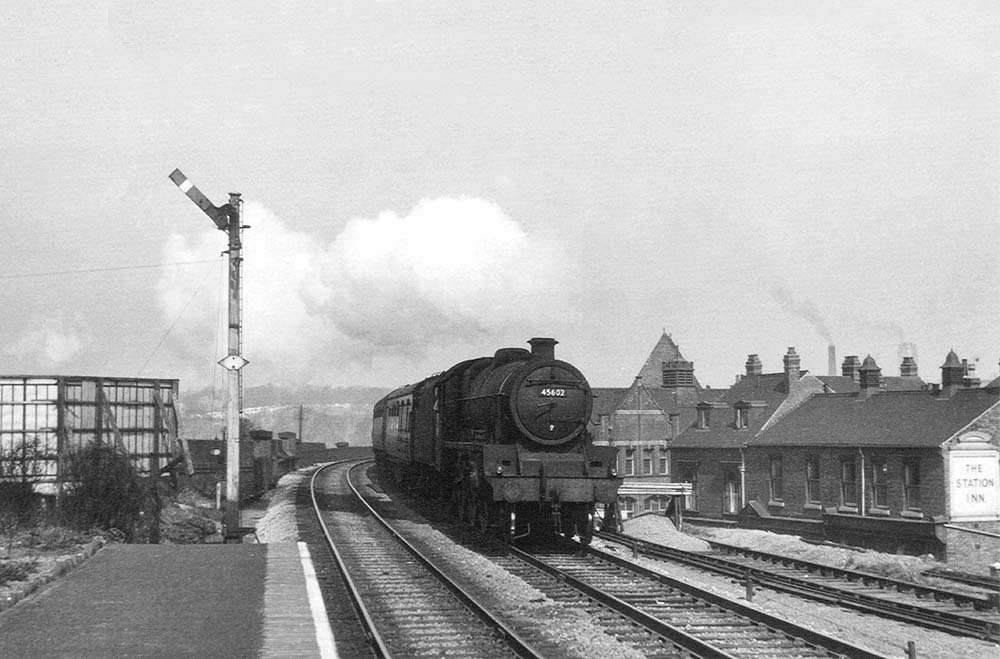Ex-LMS 4-6-0 Jubilee Class No 45602 'British Honduras' is see passing through Selly Oak at speed with a Bristol express on 19th April 1954