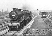 Ex-LMS 4-4-0 2P No 40463 is seen piloting ex-LNER 4-6-0 B1 No 61195 light engine on 19th April 1954