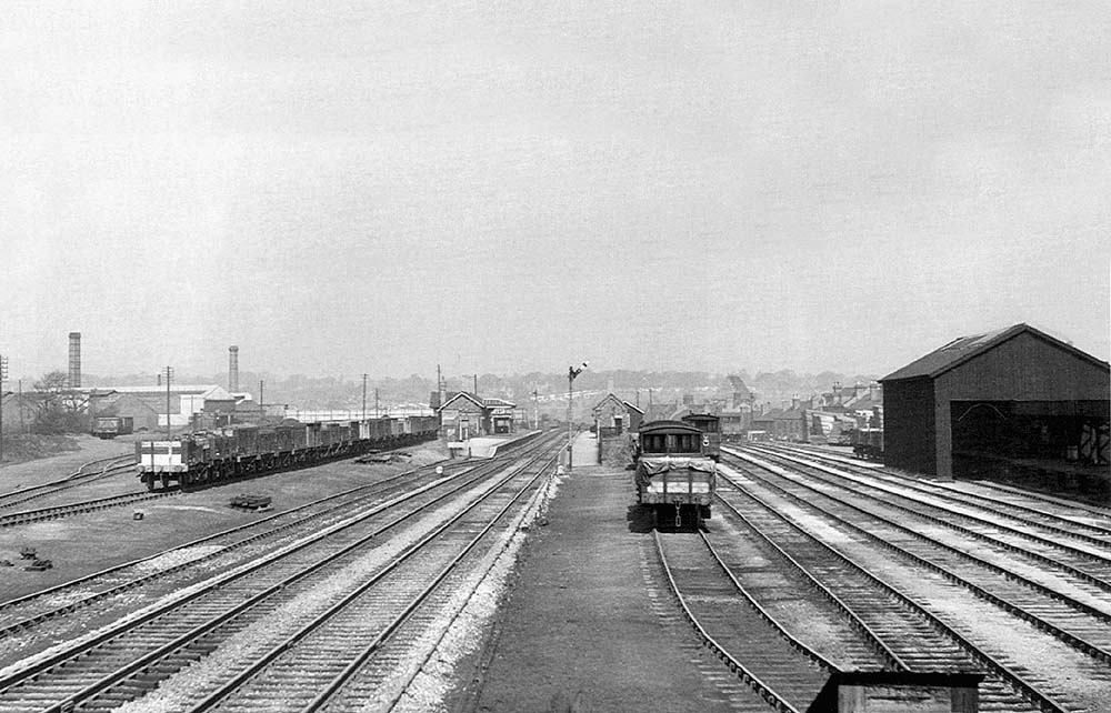 View looking towards Birmingham of Selly Oak station showing it centred in the middle of sidings to both the up and down lines
