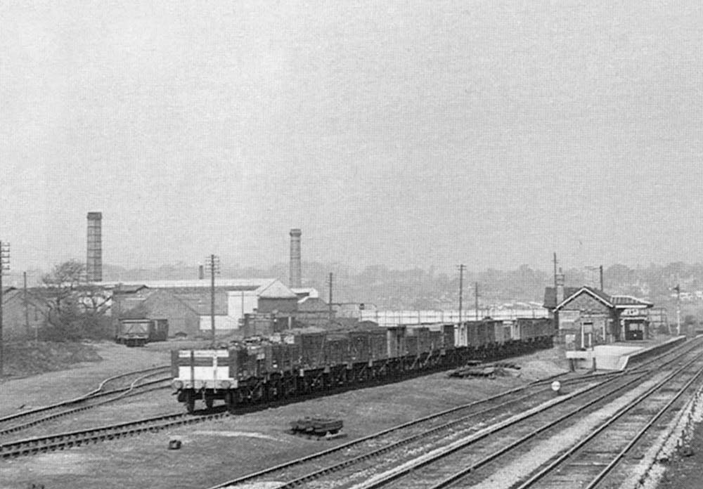 Close up showing the juxtaposition between Selly Oak station's up platform and the up sidings