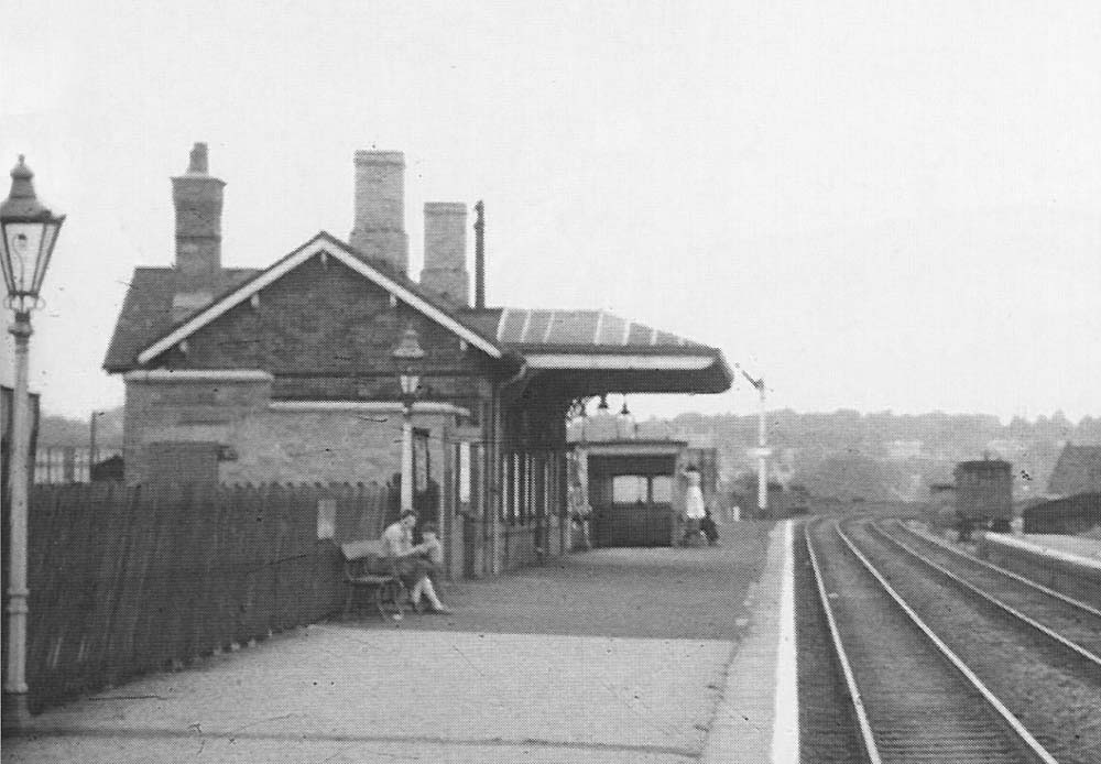 Close up showing Selly Oak station's main station building on the up platform and the new toilet extension