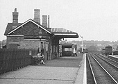 Close up showing Selly Oak station's main station building on the up platform and the new toilet extension