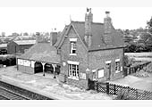 View of the station building as seen from Coleshill Road overbridge on Sunday 27th September 1964