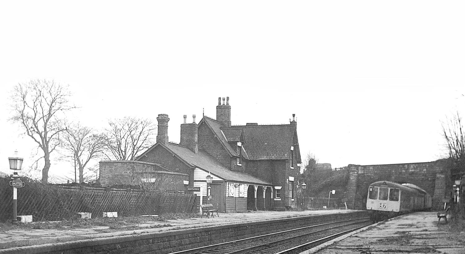 A Nuneaton to Birmingham Diesel Multiple Unit train draws into Shustoke station shortly before closure