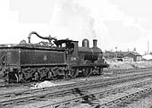 Ex-L&Y 0-6-0 No 52141 stands by the water crane during shunting duties in Stockingford marshalling yard