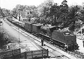 LMS 4F 0-6-0 No 4069 is seen working tender first at the head of an engineer's ballast train one Sunday in the 1930s