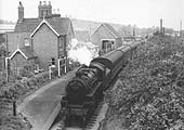 British Railways built 4MT 2-6-0 No 43036 is seen at the head of the 5:10pm Birmingham to Ashchurch service