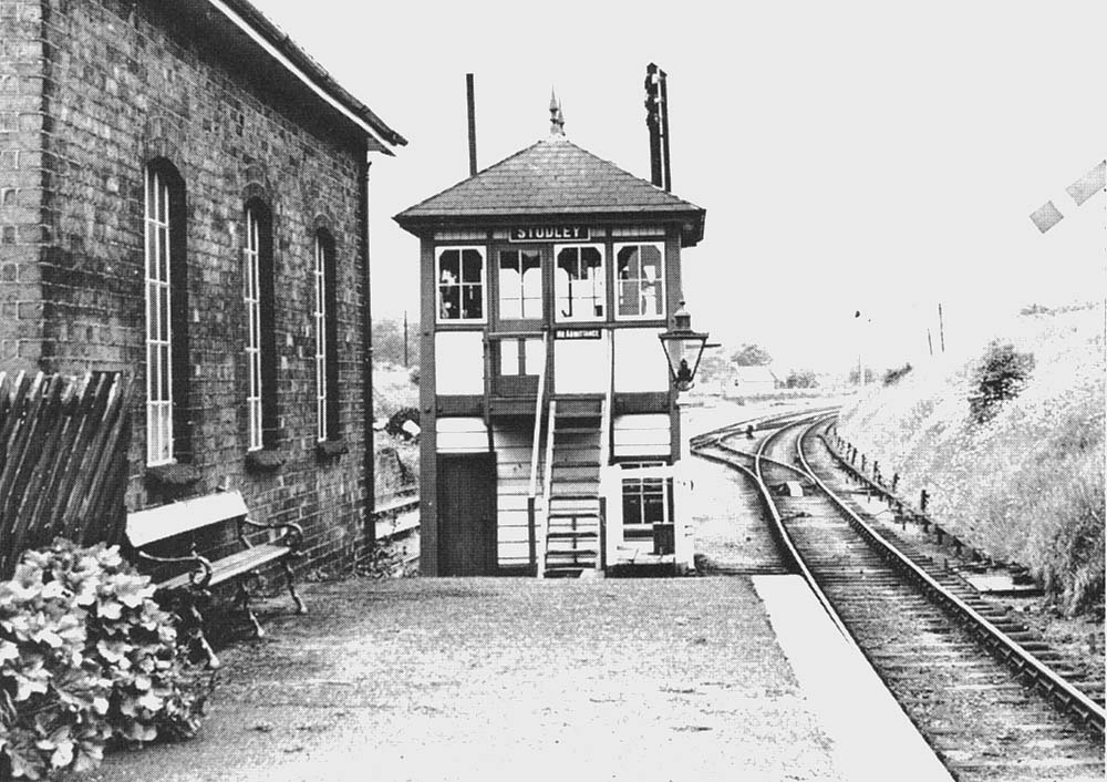 Later view of the signal box showing part of the landing dock visible between the signal box and goods shed now in disrepair