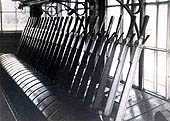 An internal view of Sutton Park signal box showing the twenty-four lever frame sited at the front of the box