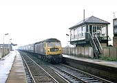 British Railways Type 4 Co-Co D1938 locomotive at the head of an up express service passes through Tamworth
