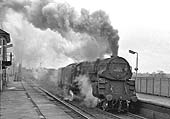 British Railways Standard Class 9F 2-10-0 No 92025 passes through Tamworth on a down freight service