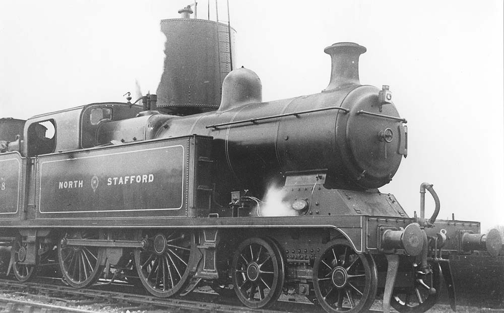 North Staffordshire Railway 3P 4-4-2T No 8 stands at Tamworth on a Birmingham New Street to Derby service on 19th April 1923