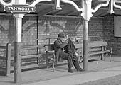 One of Tamworth High Level Station's passengers waits patiently for the next service to New Street circa 1960