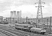 British Railways Type 4 No D139 is seen with a brake-tender in tow needed for working loose-coupled freight trains on 5th September 1962