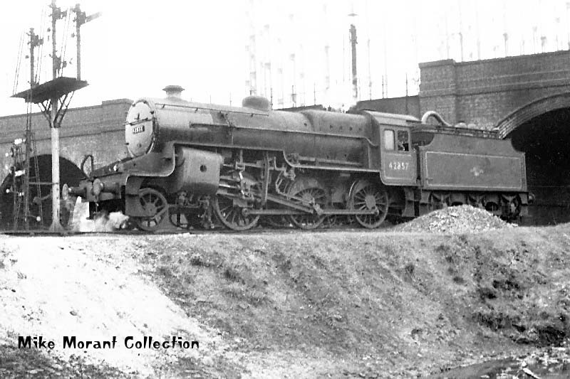 Ex-LMS 6P5F 2-6-0 No 42857 is seen standing with the bridge carrying the ex-LNWR Stechford line over the ex-Midland line to Derby
