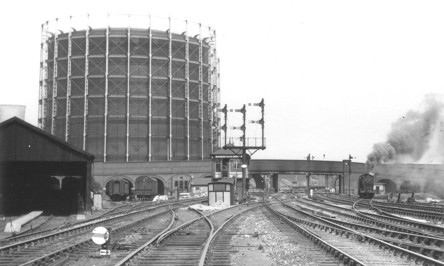 Looking West towards Bromford Bridge with Washwood Heath Sidings No 1 Signal Box in the centre and the bank engine leaving the sidings on the right