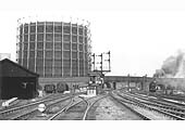Looking West towards Bromford Bridge with Washwood Heath Sidings No 1 Signal Box in the centre and the bank engine leaving the sidings on the right