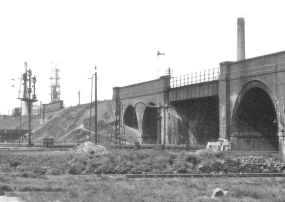 Close up showing the former LNWR bridge carrying the Aston to Stechford line over the former MR Derby to Birmingham line showing the water crane located on the down side