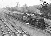 British Railways built 4MT 2-6-0 No 43036 exits the Leicester line with an express service for New Street on 28th February 1959