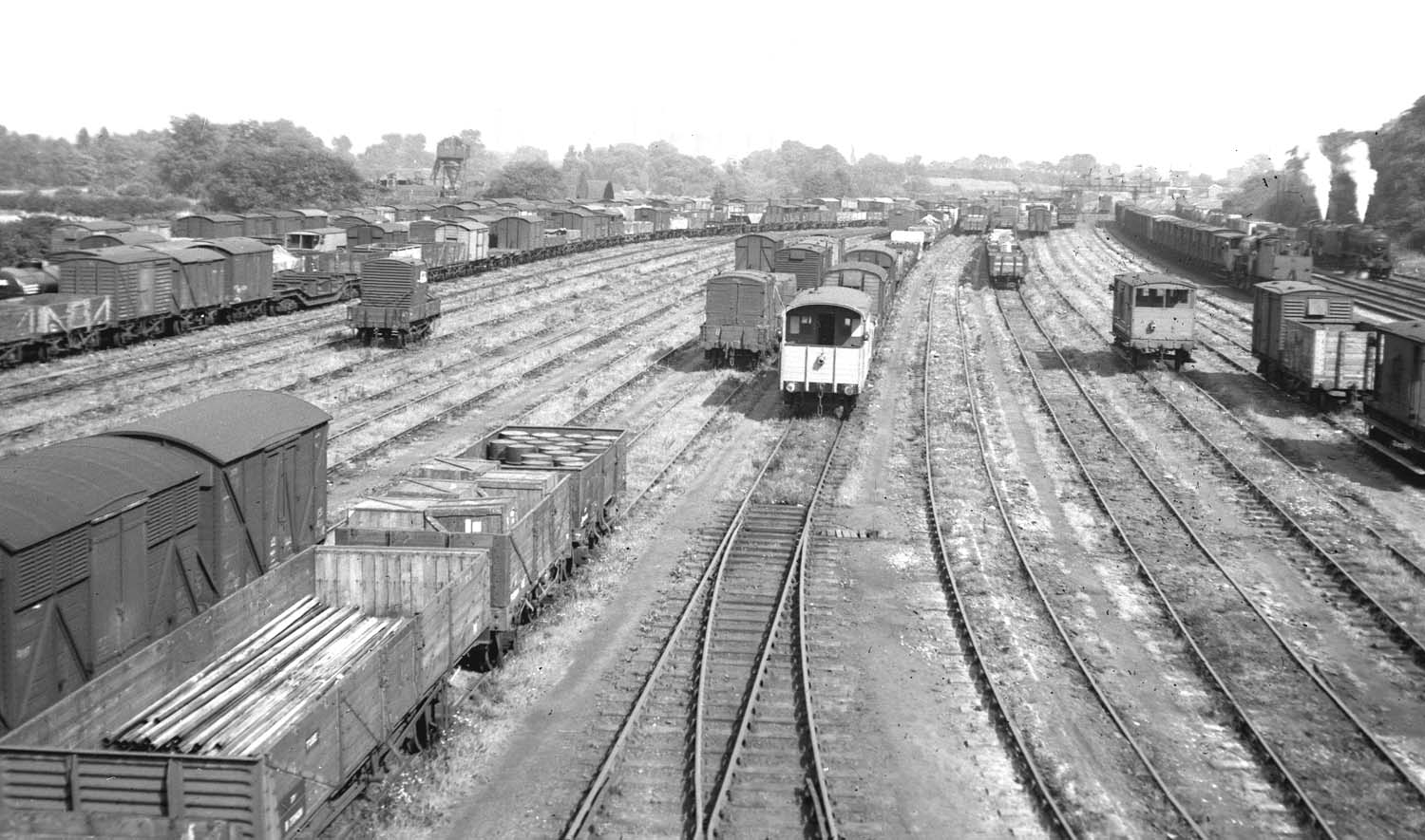 Looking along the marshalling sidings towards Water Orton station with the up signal gantry in the distance