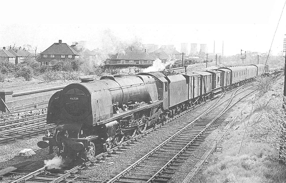 Ex-LMS 8P 4-6-2 No 46239 'City of Chester' leaves the Leicester line whilst heading a parcels service on 3rd May 1964