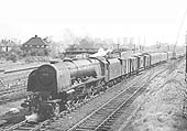 Ex-LMS 8P 4-6-2 No 46239 'City of Chester' leaves the Leicester line at the head of a down parcels service