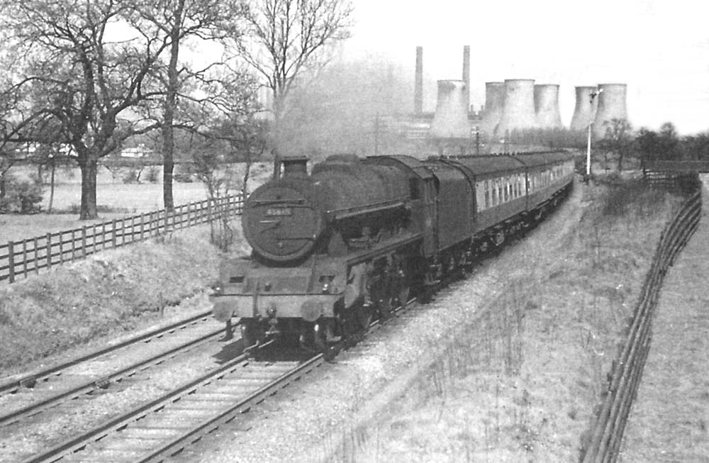 Ex-LMS 5XP 4-6-0 No 45699 'Galatea' uses the fast lines on a down Bristol express on 8th May 1954
