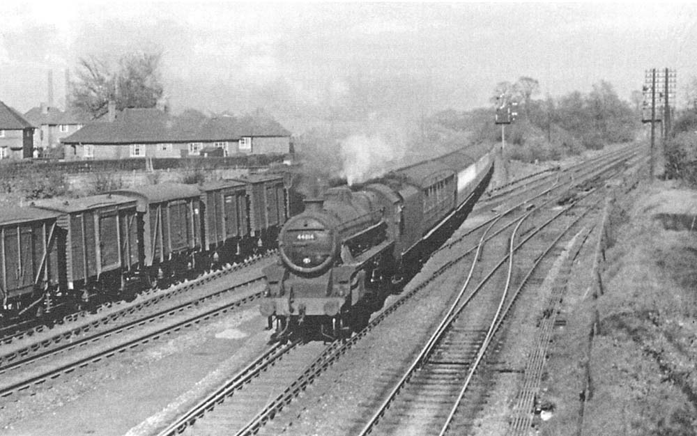 Ex-LMS 5MT 4-6-0 No 44814 crosses over from the Derby line on a New Street express service circa 1956