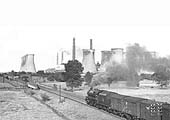 An unidentified ex-LMS 'Black Five' on a fitted freight heading North on the fast line on 1st September 1952