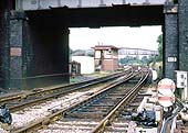 Looking through the down section of the overbridge and showing the BR replacement signal box