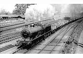 Ex-Midland Railway 0-6-0 3F No 3147 is seen at the head of a Class H freight service coming off the Leicester line