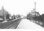 View of Water Orton's original station showing the staggered platforms either side of the footbridge circa 1900