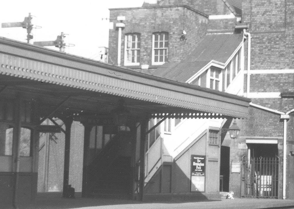 Close up showing the passenger stairway and the lift used to transport goods from the platform to Marsh Lane