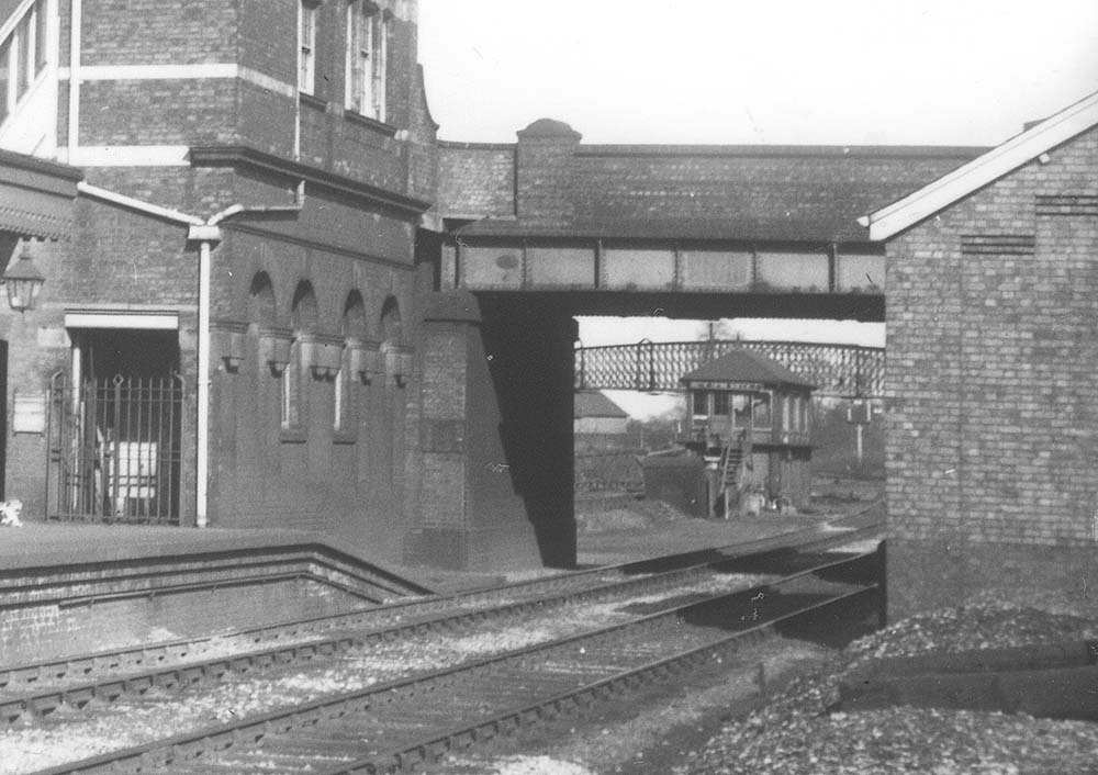 Close up looking through the overbridge showing the original 1909 Midland Railway signal box