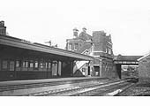 Looking from the goods yard towards Water Orton's island platform with the MR signal box seen through the bridge