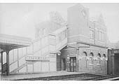  A 1908 view of the two storey brick built main station building and the wooden covered stairway leading down from the booking hall